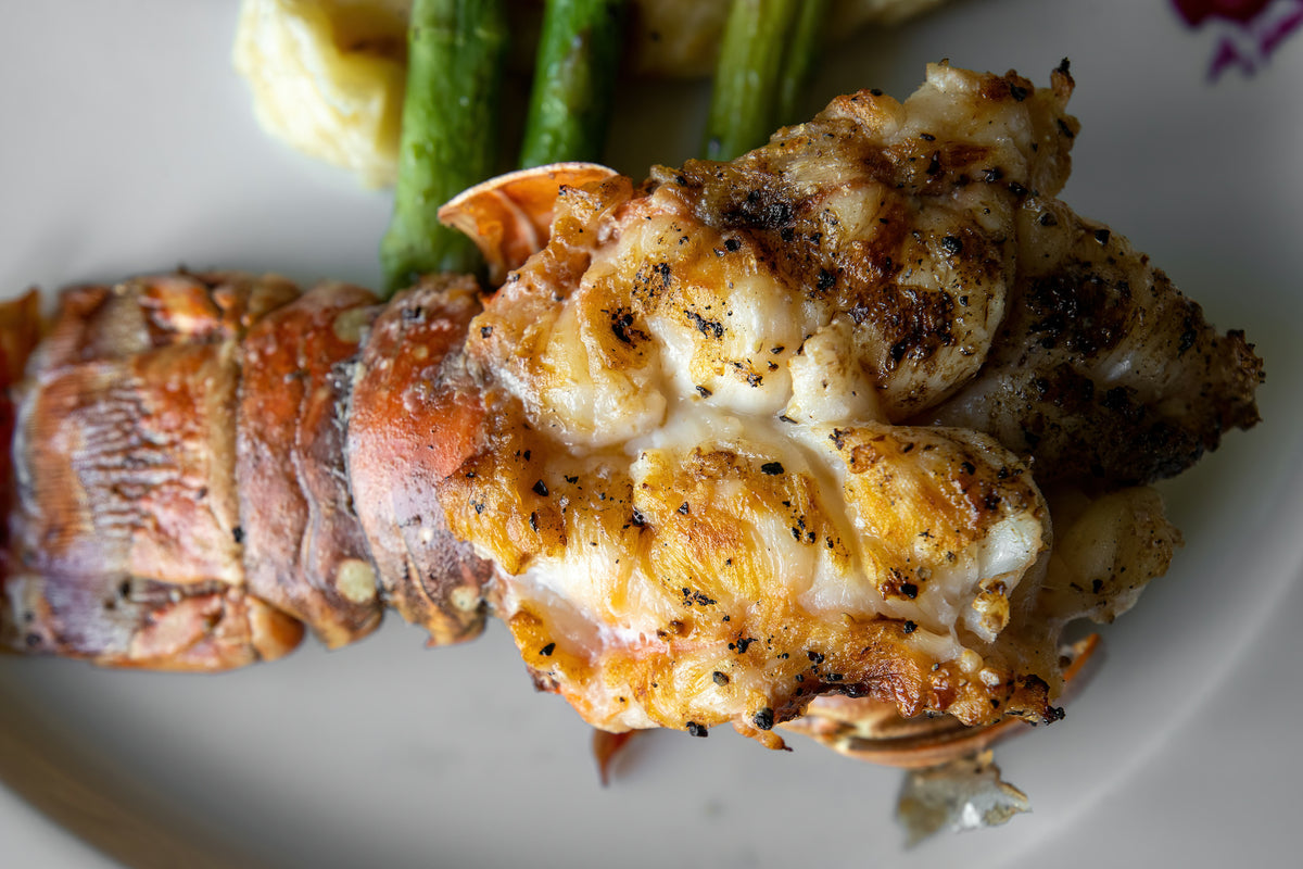 Grilled Lobster Tails with Red Chili Pepper Herb Butter American Made