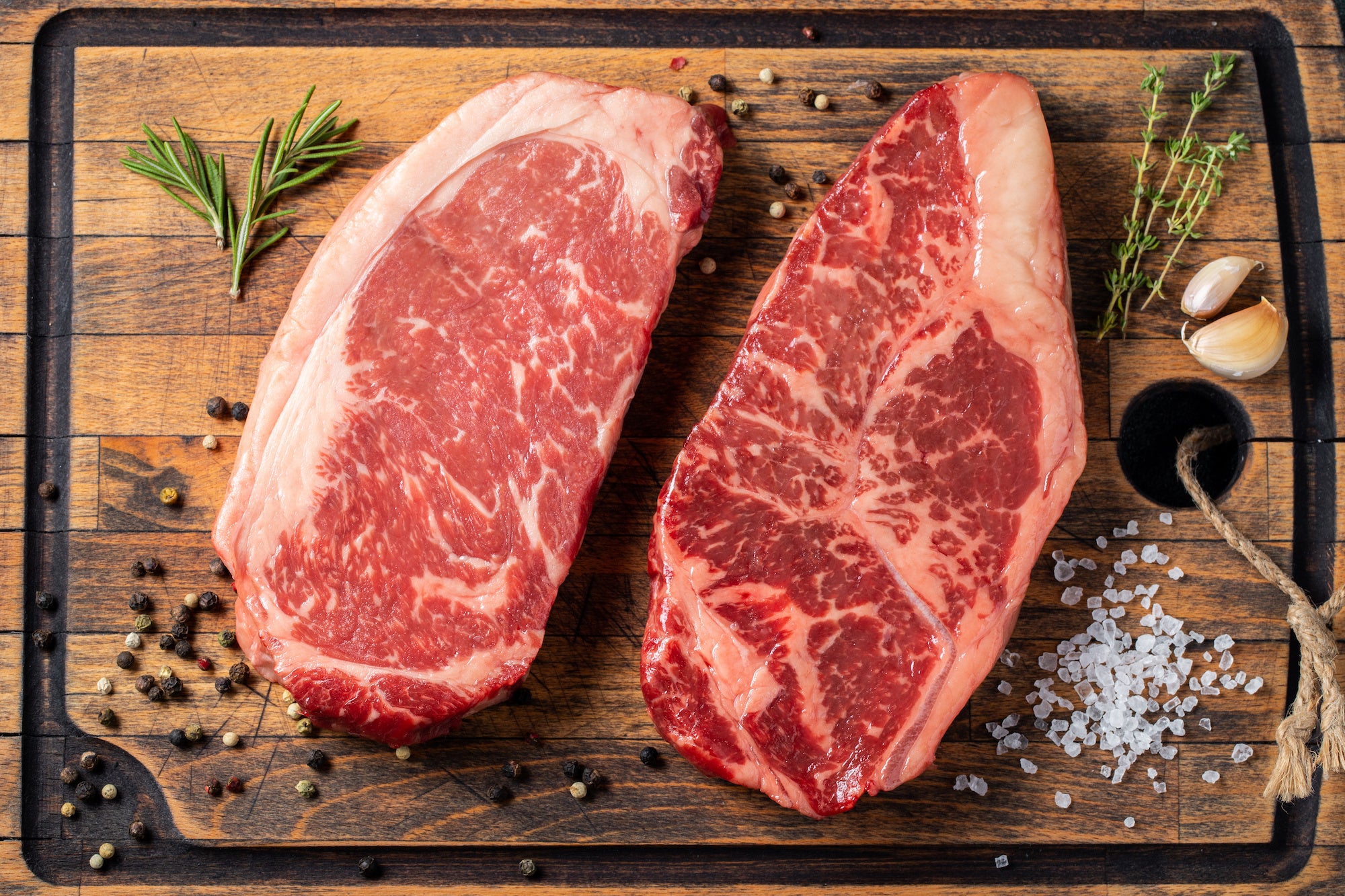 The Differences Between New York Strip and Ribeye – American Made